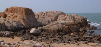 Looking across rocks towards the sea