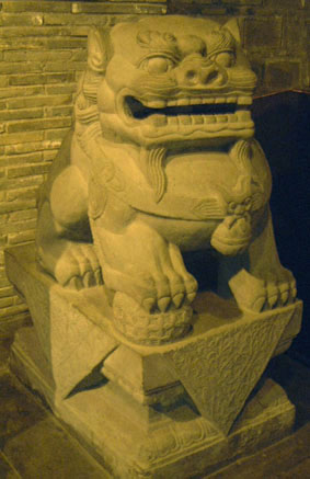 Guardian lion in California Garden Hotel, Chengdu (male)